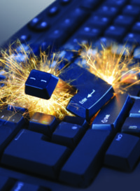 4540148 - black exploding computer keyboard with electric sparks.